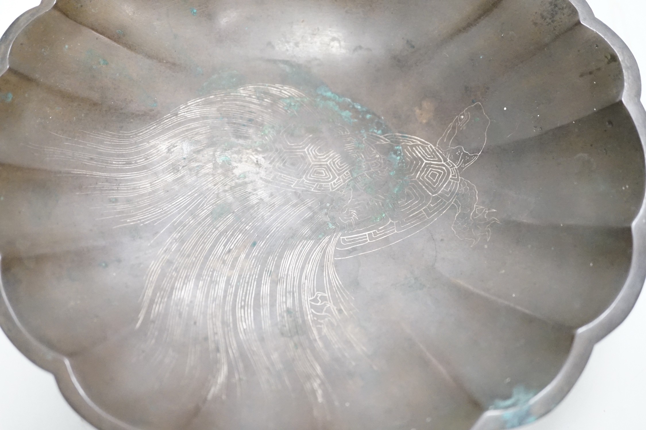 A Japanese silver wire inlaid bronze shell shaped dish, Meiji period. Signed to reverse, 22cm